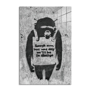 Glasbild - Affe mit Schild