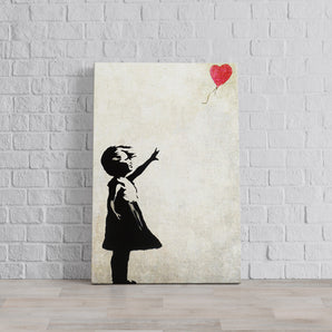 Leinwandbild - Kind mit rotem Ballon